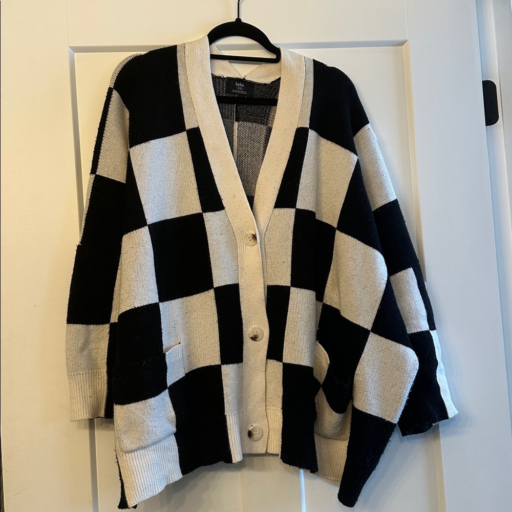 Dressed in La La Checkered oversized cardigan